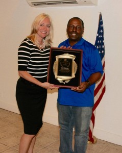 Boys and Girls Club Exec Director Neil Canton (right) Presents Lisa Hamilton (left) with Champion of Youth Award
